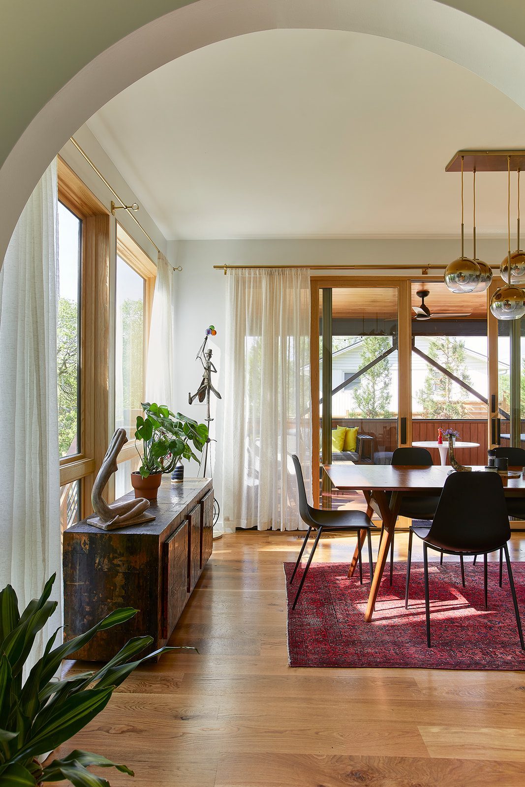 Separate dining room with mid century modern flare