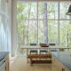 Floor to ceiling windows inside of this asheville home - Barndominium house design