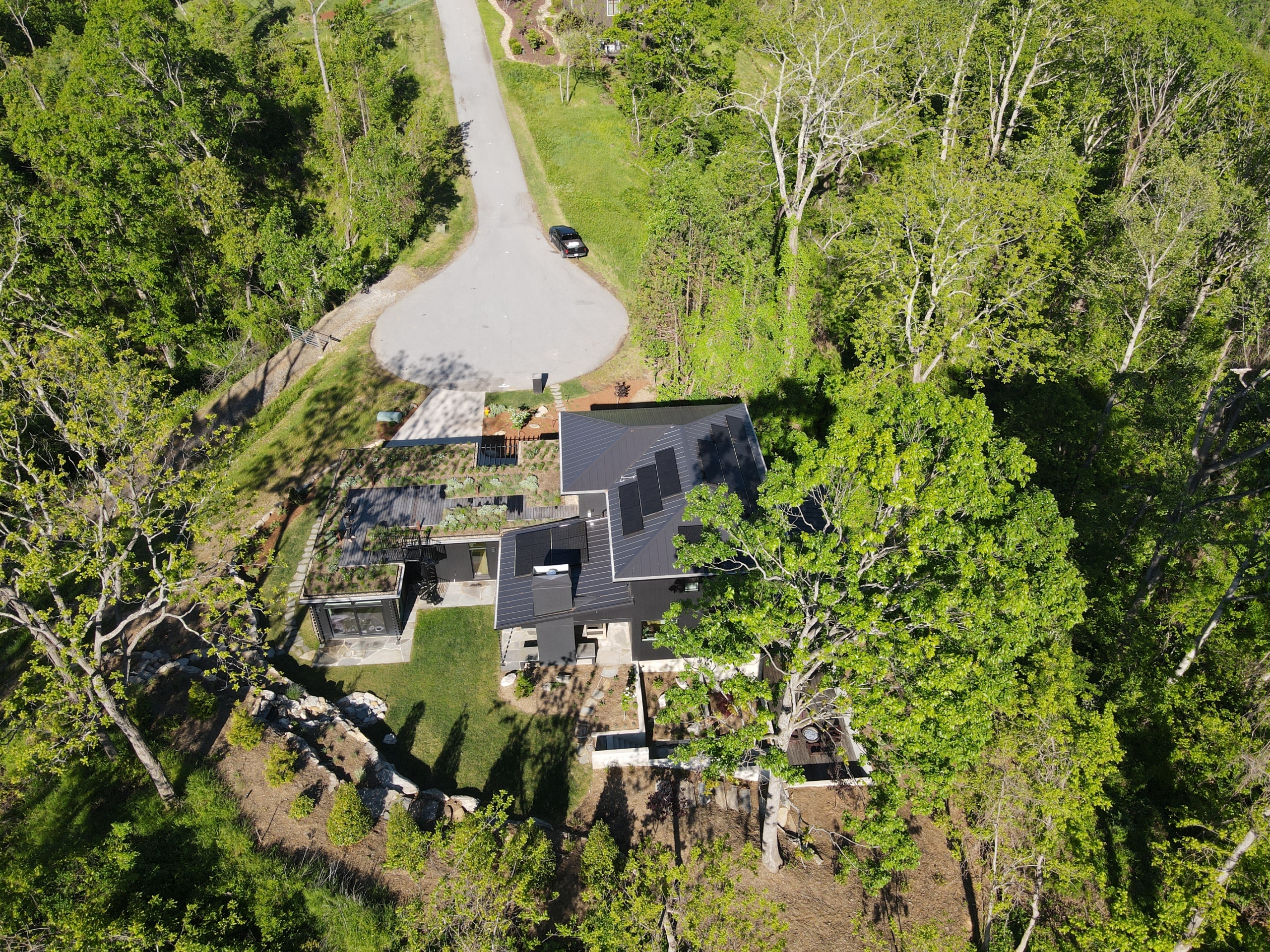 Arial view of a custom built passive solar home in WNC by Assembly AB